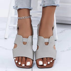Women's chic cut-out open toe flat sandals from Trendsi, featuring stylish design and comfortable summer footwear.