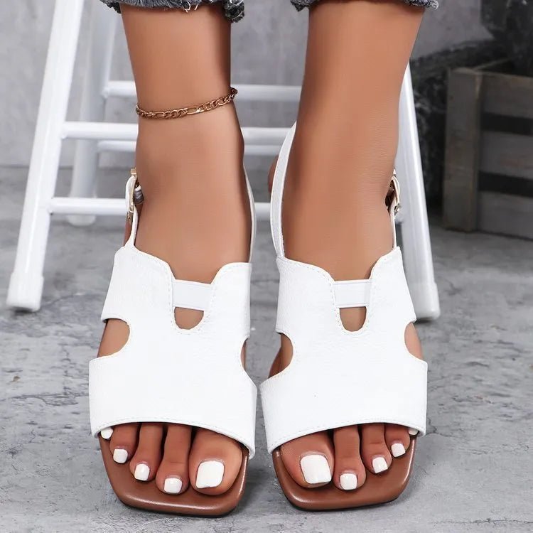 Women's chic cut-out open toe flat sandals by Trendsi, featuring stylish design and comfortable summer footwear.