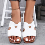 Women's chic cut-out open toe flat sandals by Trendsi, featuring stylish design and comfortable summer footwear.