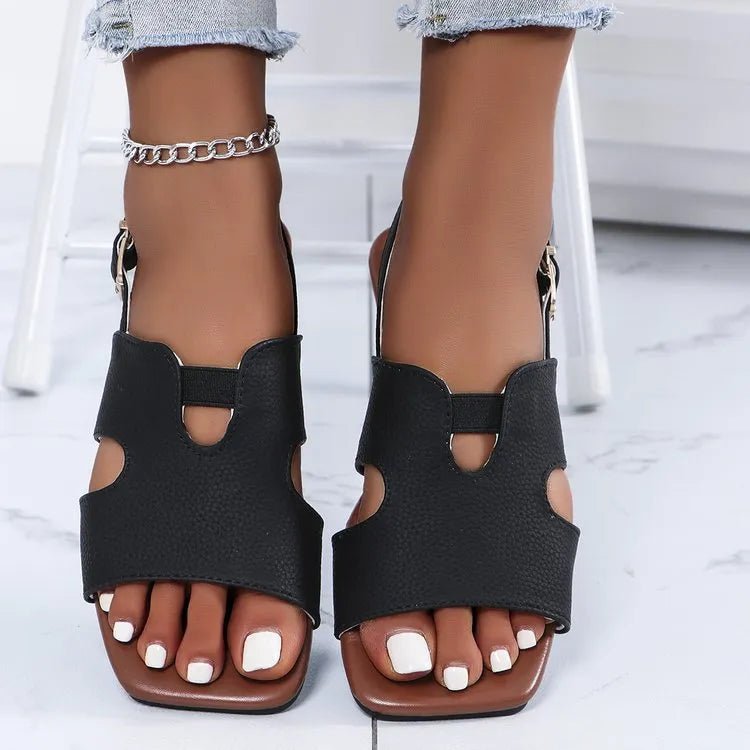Women's trendy cut-out open-toe flat sandals by Trendsi, featuring comfortable summer footwear design with stylish open toe and cut-out details.