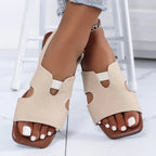Women's chic cut-out open toe flat sandals by Trendsi, featuring a stylish design and comfortable summer footwear for warm weather.