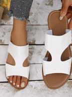 Women's vegan leather flat sandals with cutout design and open toe, stylish and comfortable shoe by Trendsi.