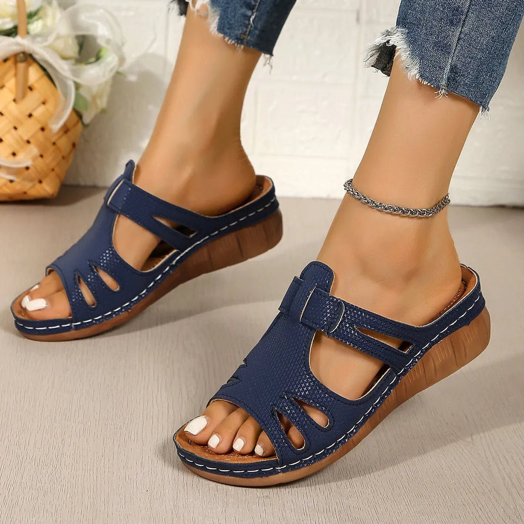 Women's chic faux leather open-toe wedge sandals with cutout design and stylish open-toe in trendy fashion.