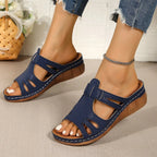 Women's chic faux leather open-toe wedge sandals with cutout design and stylish open-toe in trendy fashion.