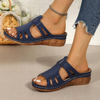 Women's chic faux leather open-toe wedge sandals with cutout design and open-toe style by Trendsi.