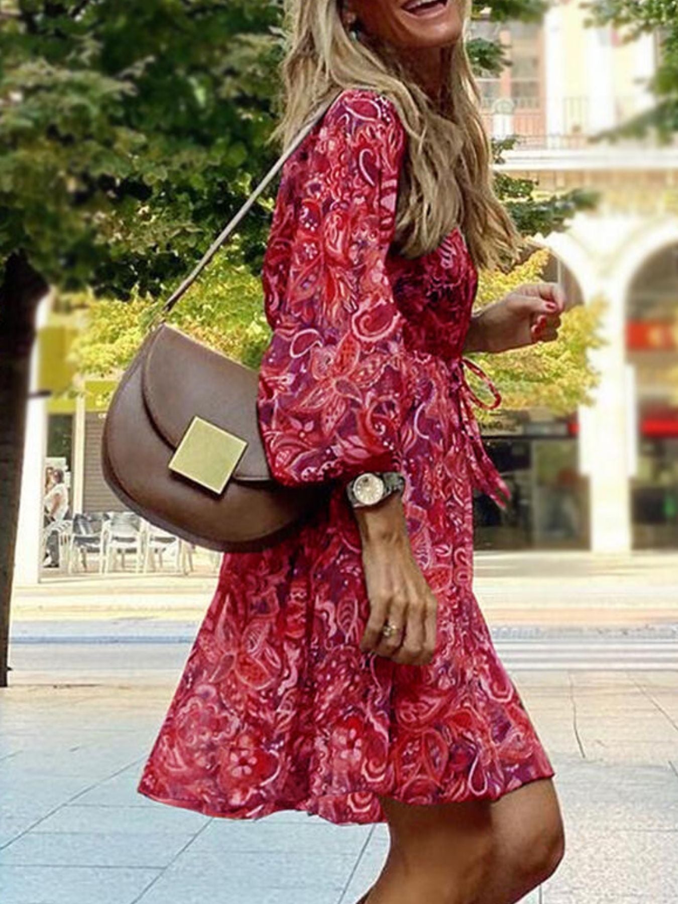 Paisley print balloon sleeve mini dress by Trendsi featuring a boho style, flowy silhouette, and vibrant pattern for stylish occasions.