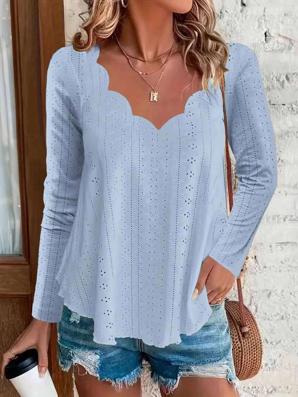Elegant women's eyelet long sleeve blouse from Trendsi, featuring versatile stretchy fabric and stylish office-appropriate design.