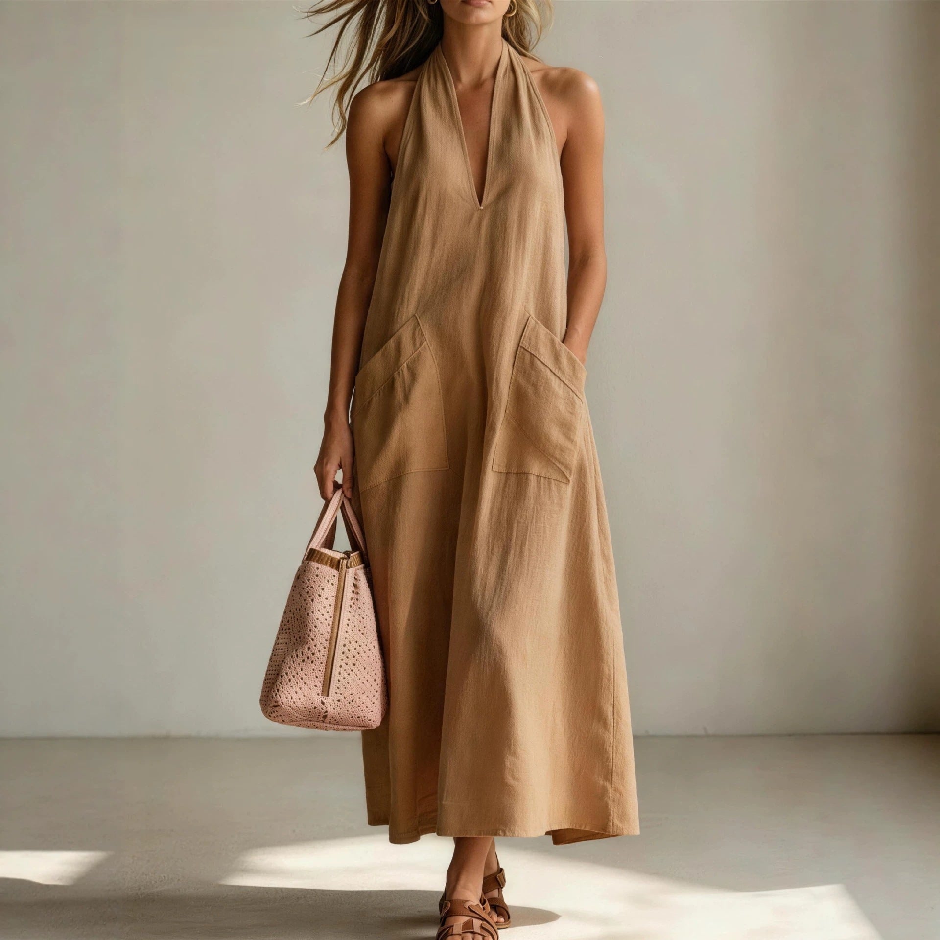 FitiqueFit cotton halterneck sleeveless dress with deep V-neck and loose straight-line design for casualwear.