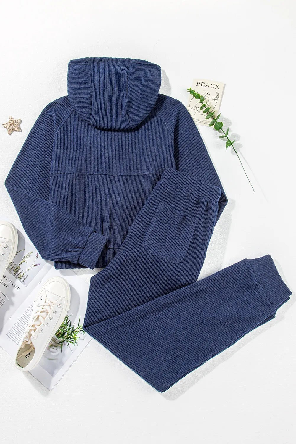 Women's half-zip drawstring hoodie and jogger lounge set, stylish 2-piece sweat suit by Trendsi, perfect for casual wear.