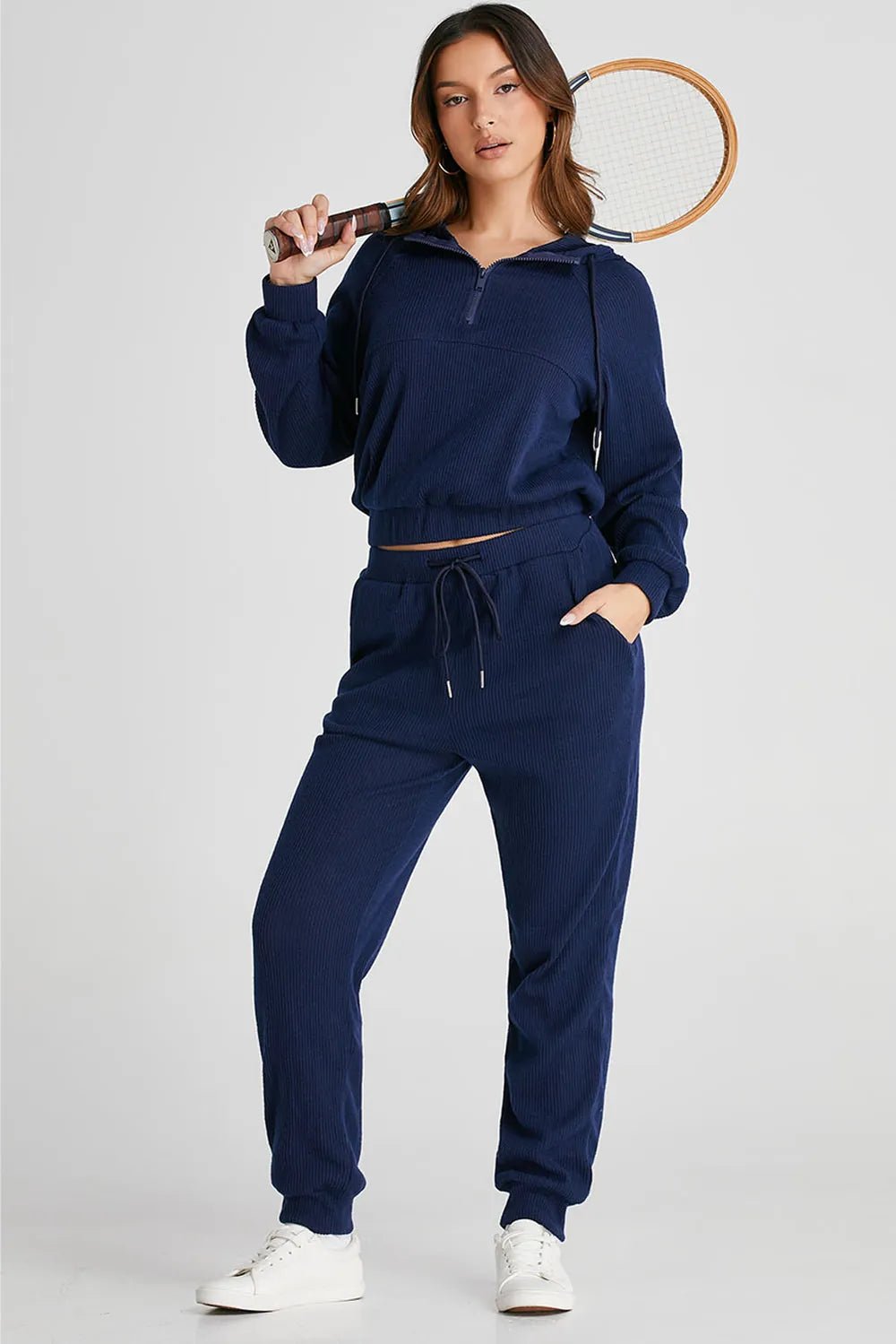 Women's half-zip drawstring hoodie and jogger lounge set, trendy activewear 2-piece sweat suit by Trendsi.