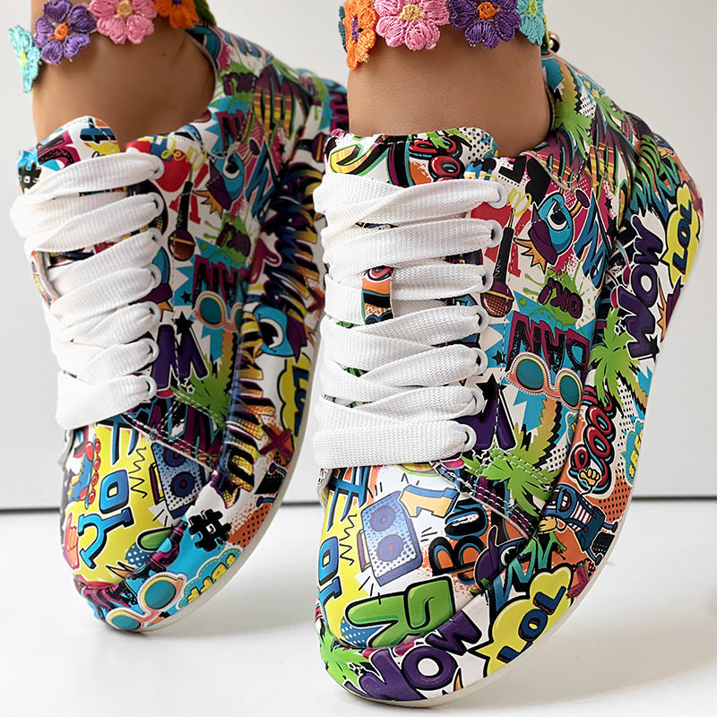 Multi-colored, pop art print lace-up sneakers with white laces and embroidered floral ankle detailing.