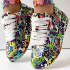 Multi-colored, pop art print lace-up sneakers with white laces and embroidered floral ankle detailing.