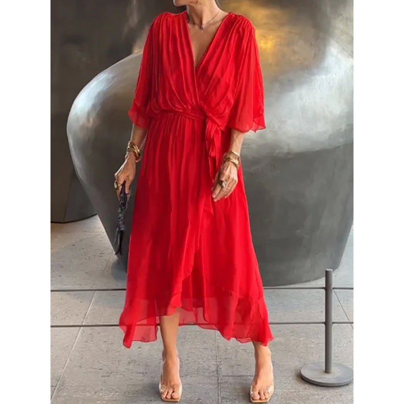 Plush Fashion Hub batwing sleeve V-neck midi dress with tied irregular hem, flowing fairy dress style, in soft fabric.