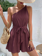 Elegant one-shoulder tie-waist romper jumpsuit in premium polyester, perfect for summer, by Trendsi.