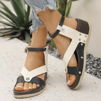 Women's leopard print wedge sandals with ankle straps and comfortable summer design, featuring trendy animal pattern and cushioned sole.