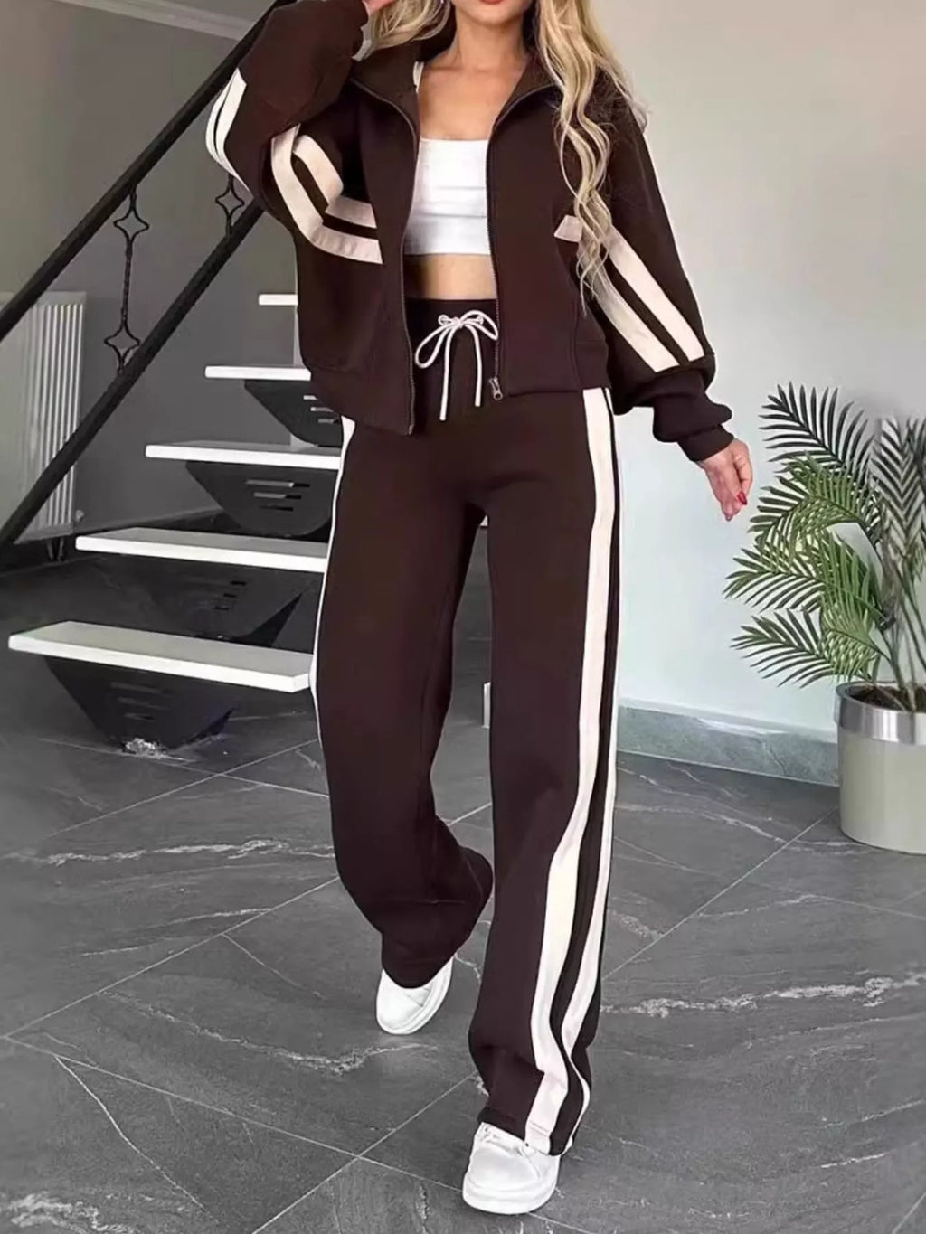 Plus size contrast stripe zip-up jacket and pants activewear set from Plush Fashion Hub, featuring bold stripe details and comfortable fit.