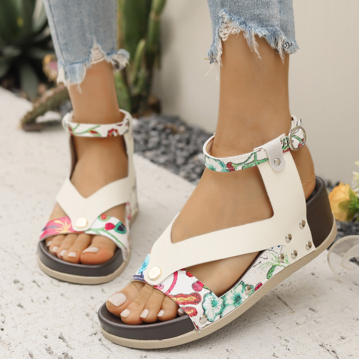 Women's leopard print ankle strap wedge sandals from Trendsi, featuring comfortable summer footwear with stylish animal pattern.