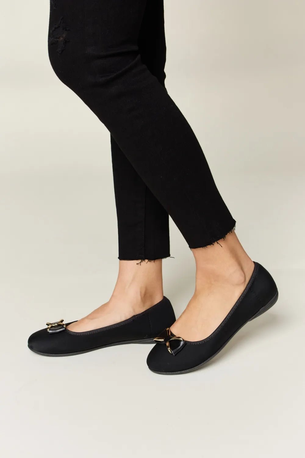 Women's metal buckle flat loafers from Trendsi, stylish and comfortable for office and casual wear, featuring a sleek metal buckle detail.
