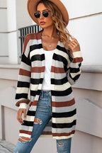 Women's striped openwork long sleeve cardigan by Trendsi, casual knitwear with a relaxed fit and stylish openwork pattern.