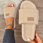 Women's plush fuzzy open toe slippers with non-slip rubber sole, trendy and comfortable footwear by Trendsi.