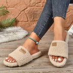 Women's plush fuzzy open toe slippers with non-slip rubber sole, comfortable and cozy shoe by Trendsi.