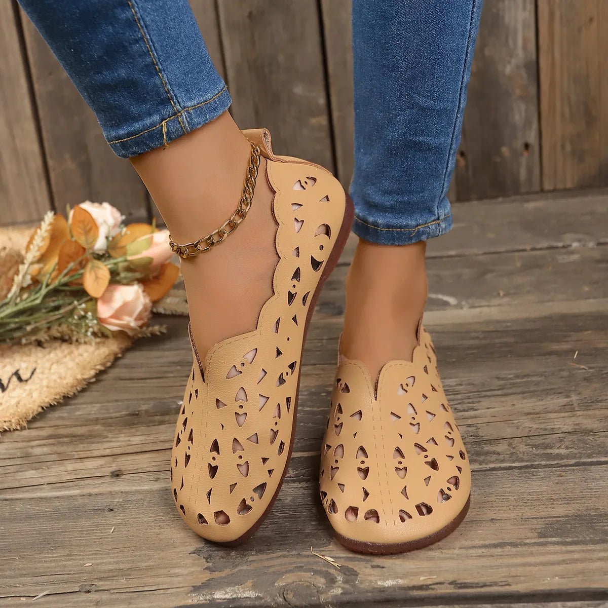 Women's hollow-out breathable slip-on shoes by Trendsi, lightweight casual flats with open design and comfortable fit.