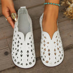 Women's hollow-out breathable casual flat slip-on shoes by Trendsi, lightweight and comfortable for everyday wear.