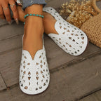 Women's hollow-out breathable casual flat slip-on shoes by Trendsi, lightweight and comfortable for everyday wear.