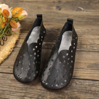 Women's breathable hollow-out casual slip-on shoes by Trendsi, featuring lightweight, flat design and comfortable open-toe style.