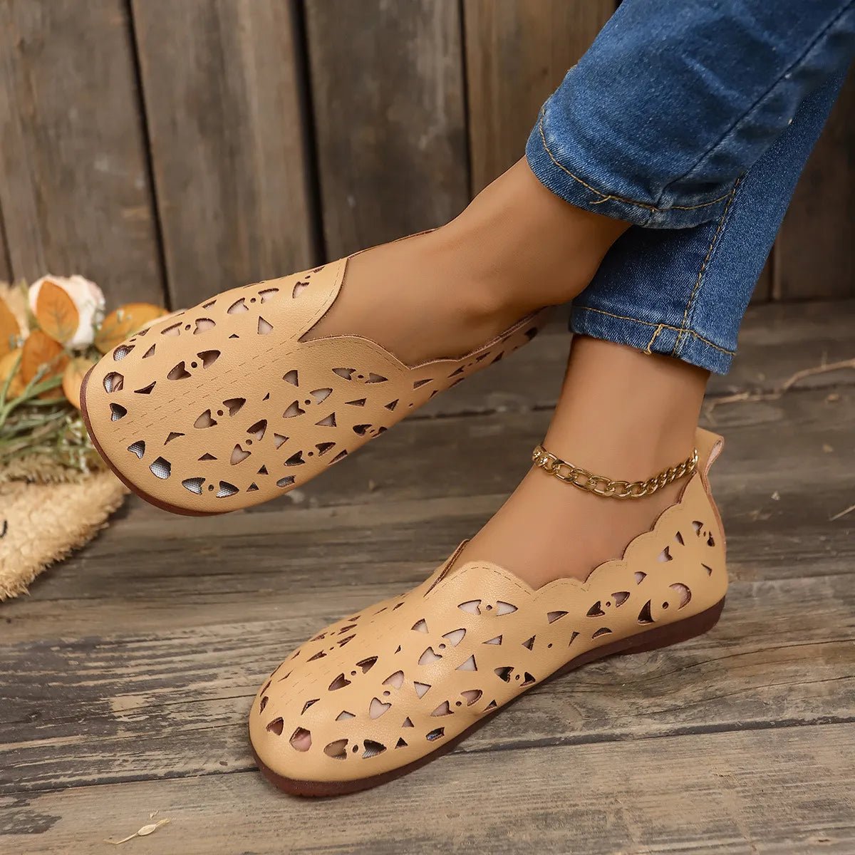 Women's breathable hollow-out casual flat slip-on shoes by Trendsi, lightweight and comfortable for everyday wear.
