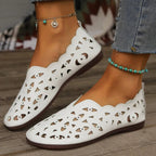 Women's breathable hollow-out casual slip-on shoes by Trendsi, featuring lightweight comfort and stylish flat design.