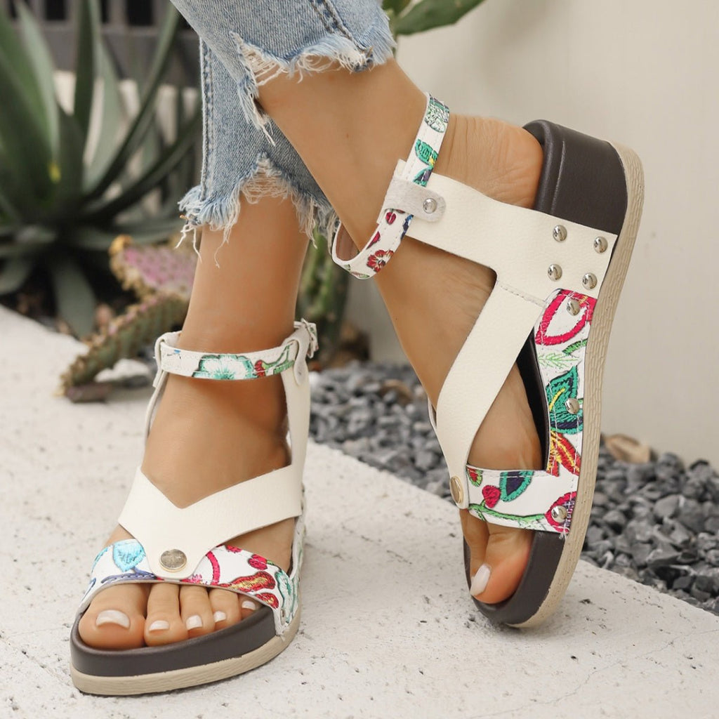 Women's leopard print ankle strap wedge sandals by Trendsi, featuring comfortable summer footwear with stylish animal print design.