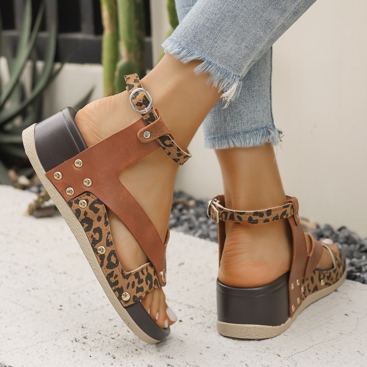 Women's leopard print ankle strap wedge sandals by Trendsi, featuring comfortable summer footwear with a stylish animal pattern.