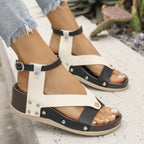 Women's leopard print ankle strap wedge sandals by Trendsi, stylish summer footwear with comfortable wedge heel.