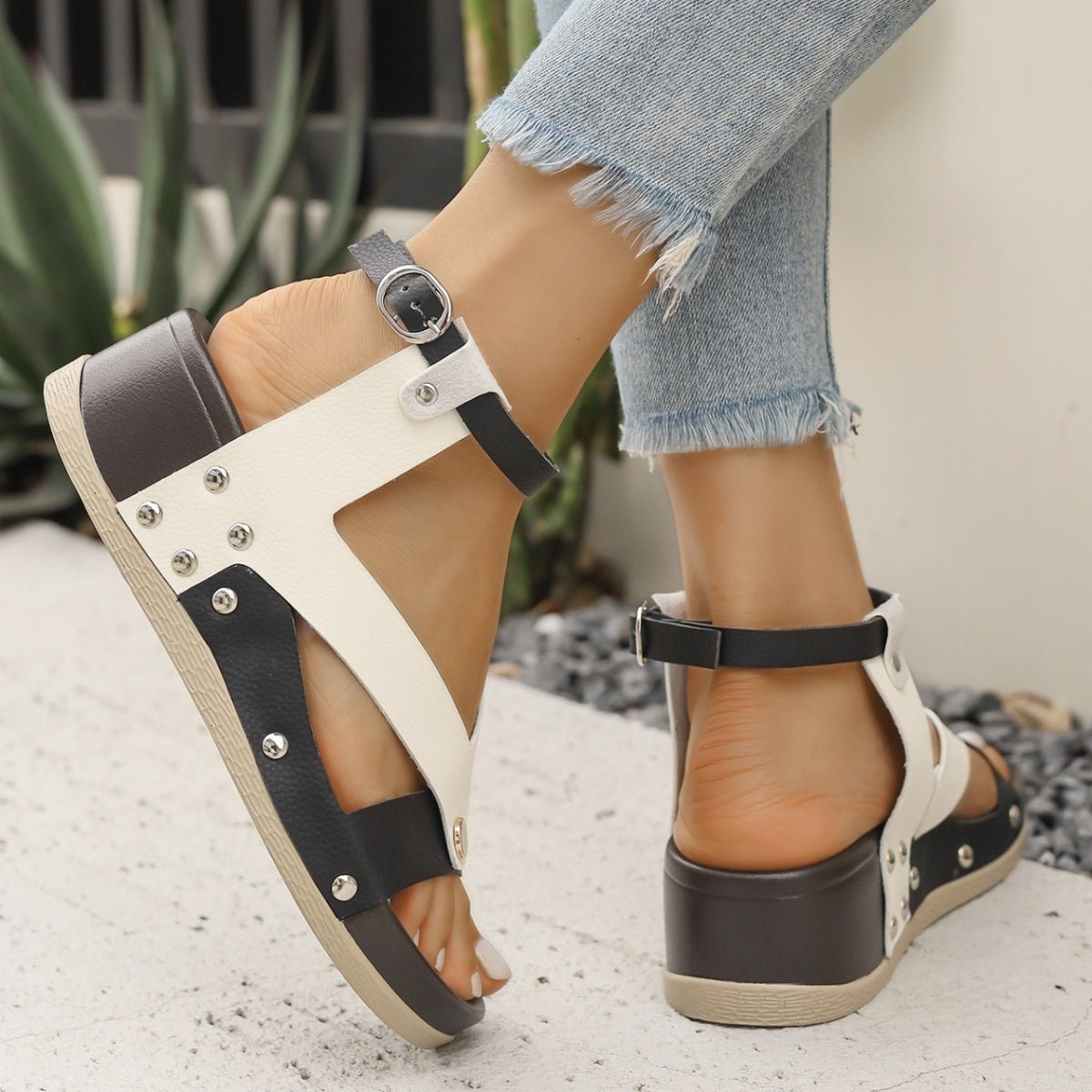 Women's leopard print ankle strap wedge sandals from Trendsi, featuring comfortable summer footwear design and stylish animal print.