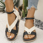 Women's leopard print ankle strap wedge sandals by Trendsi, featuring comfortable summer footwear with stylish leopard pattern and ankle strap.