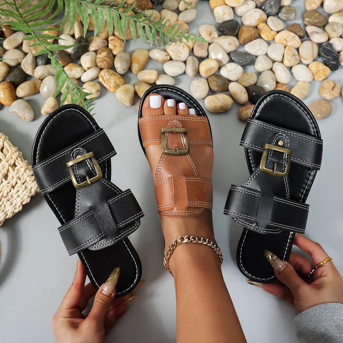 Women's brown faux leather open toe flat sandals with buckle, trendy comfortable shoes for casual wear.