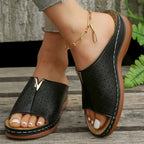Women's open toe faux leather flat sandals by Trendsi, stylish and comfortable for everyday wear.