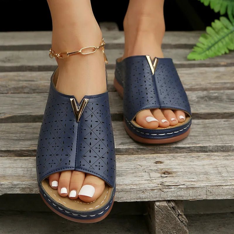Women's open toe faux leather flat sandals by Trendsi, featuring a chic design and comfortable fit for everyday wear.