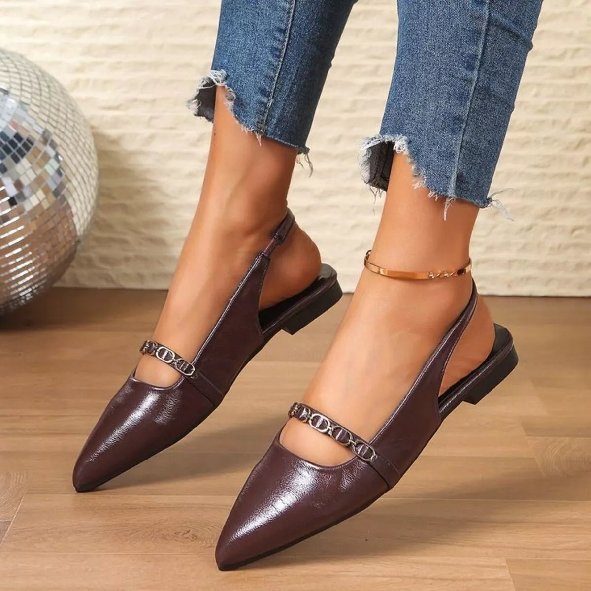Women's pointed toe slingback sandals in faux leather, stylish and sophisticated shoe by Trendsi, shown in a sleek design.