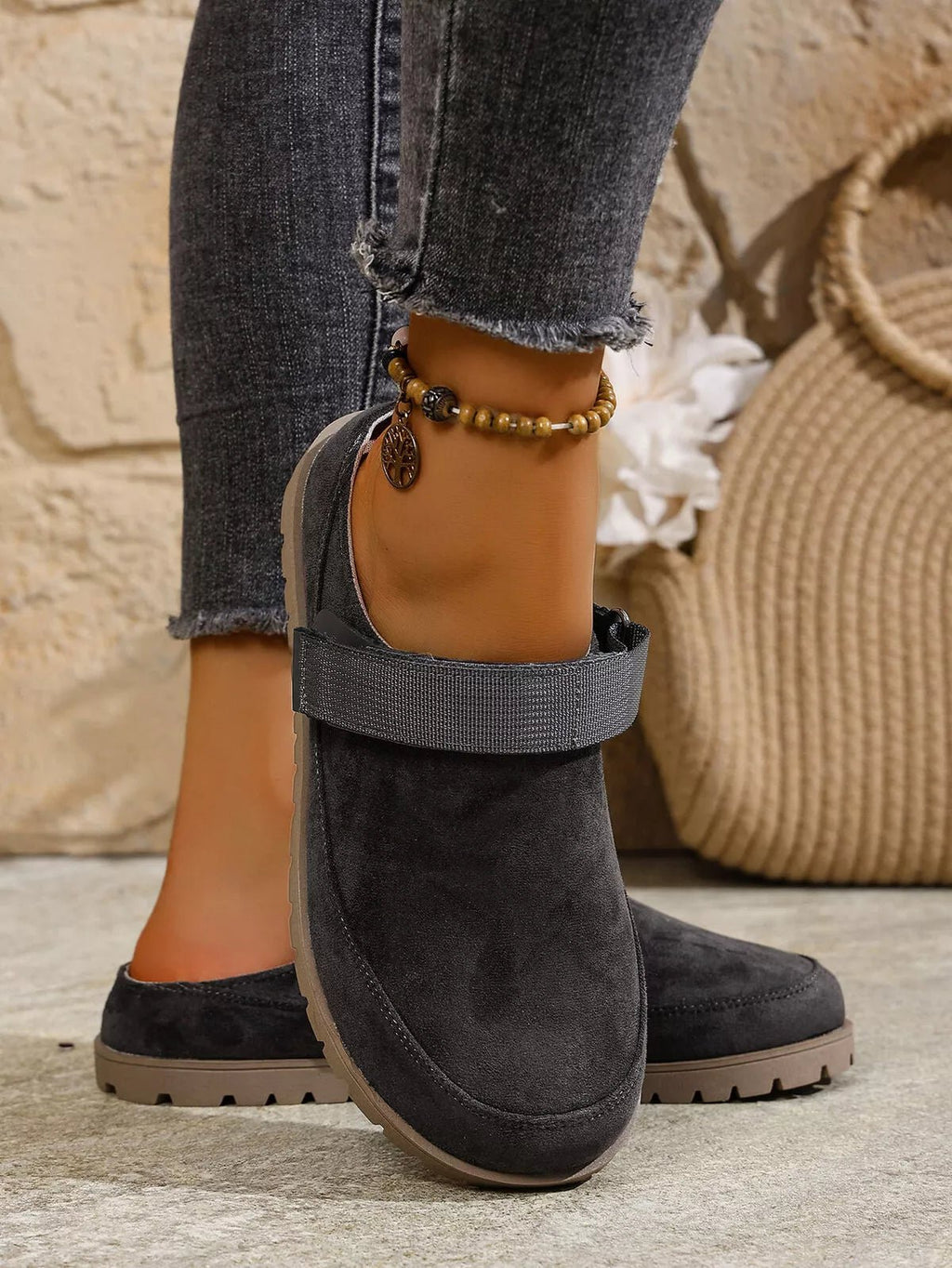 Women's round toe slip-on casual flats made of faux leather, featuring a comfortable and stylish design by Trendsi.