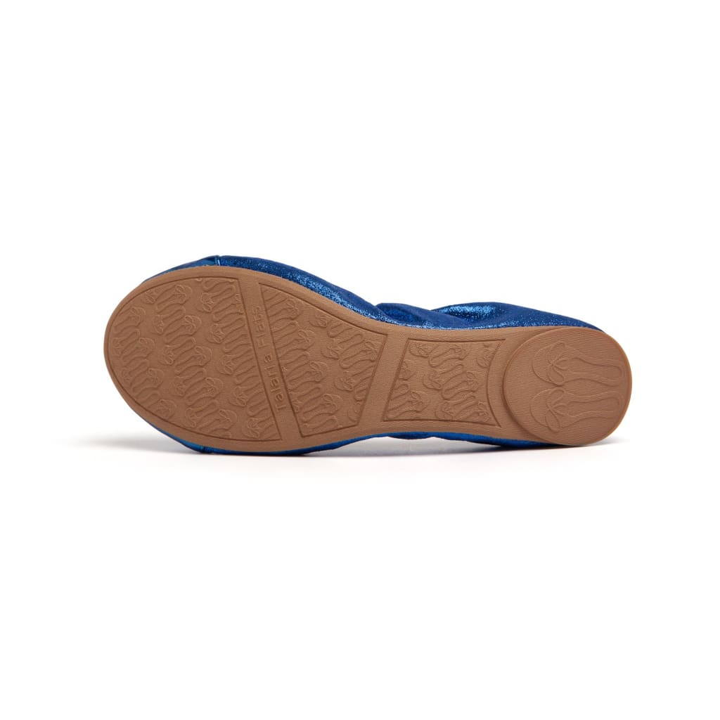 Cobalt blue metallic ballet flat shown from the bottom, featuring a tan rubber sole with textured logo detail.