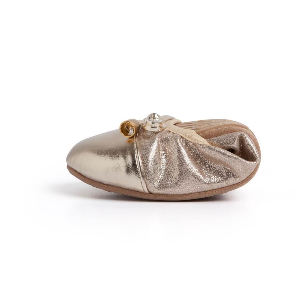 Metallic gold Talaria Littles ballet flat with a soft, gathered texture and a small decorative strap detail.