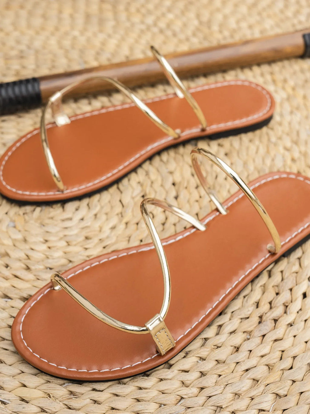 Women's strappy PU leather flat sandals with comfortable design, perfect for everyday summer wear.