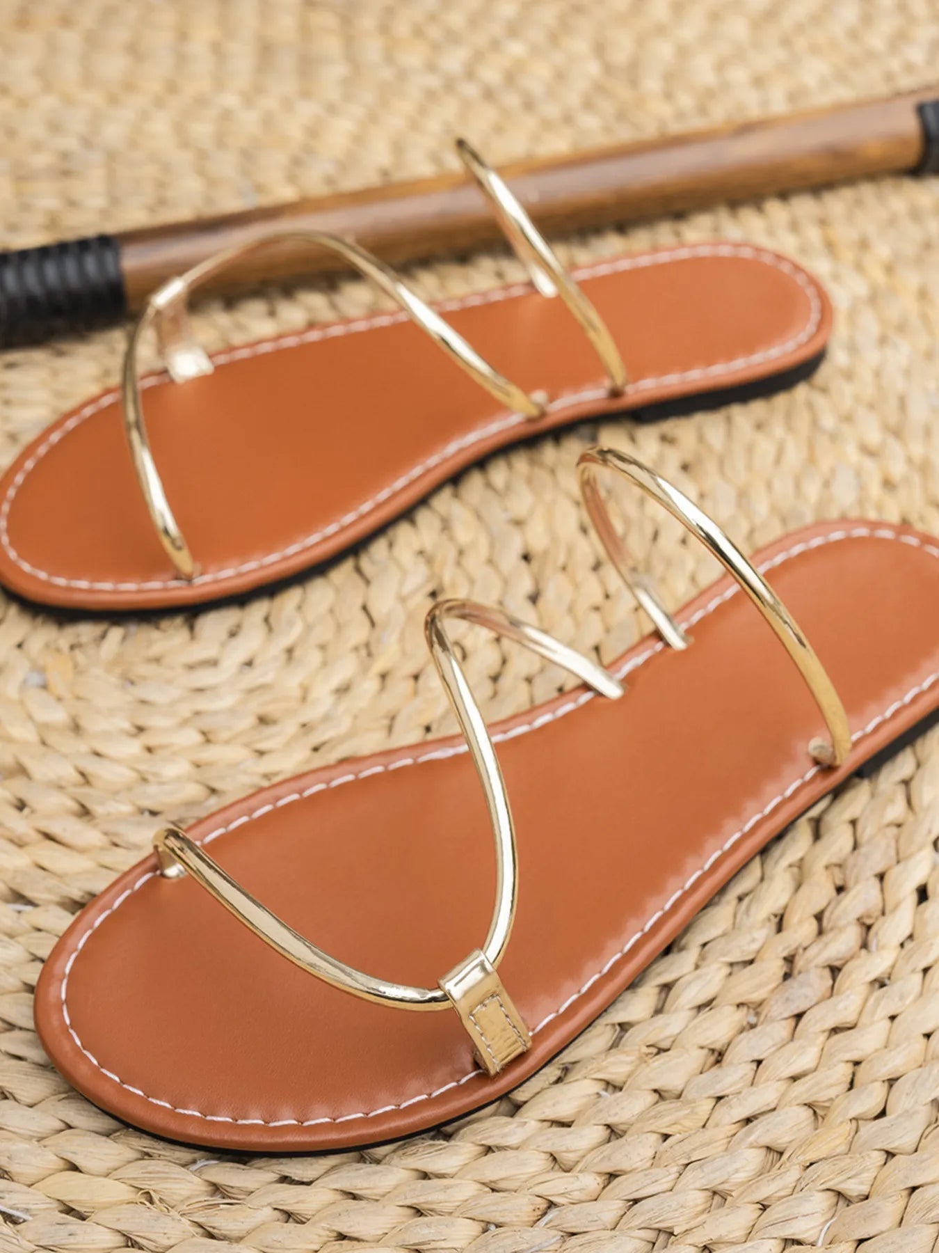 Women's strappy PU leather flat sandals with comfortable design, perfect for everyday summer wear.