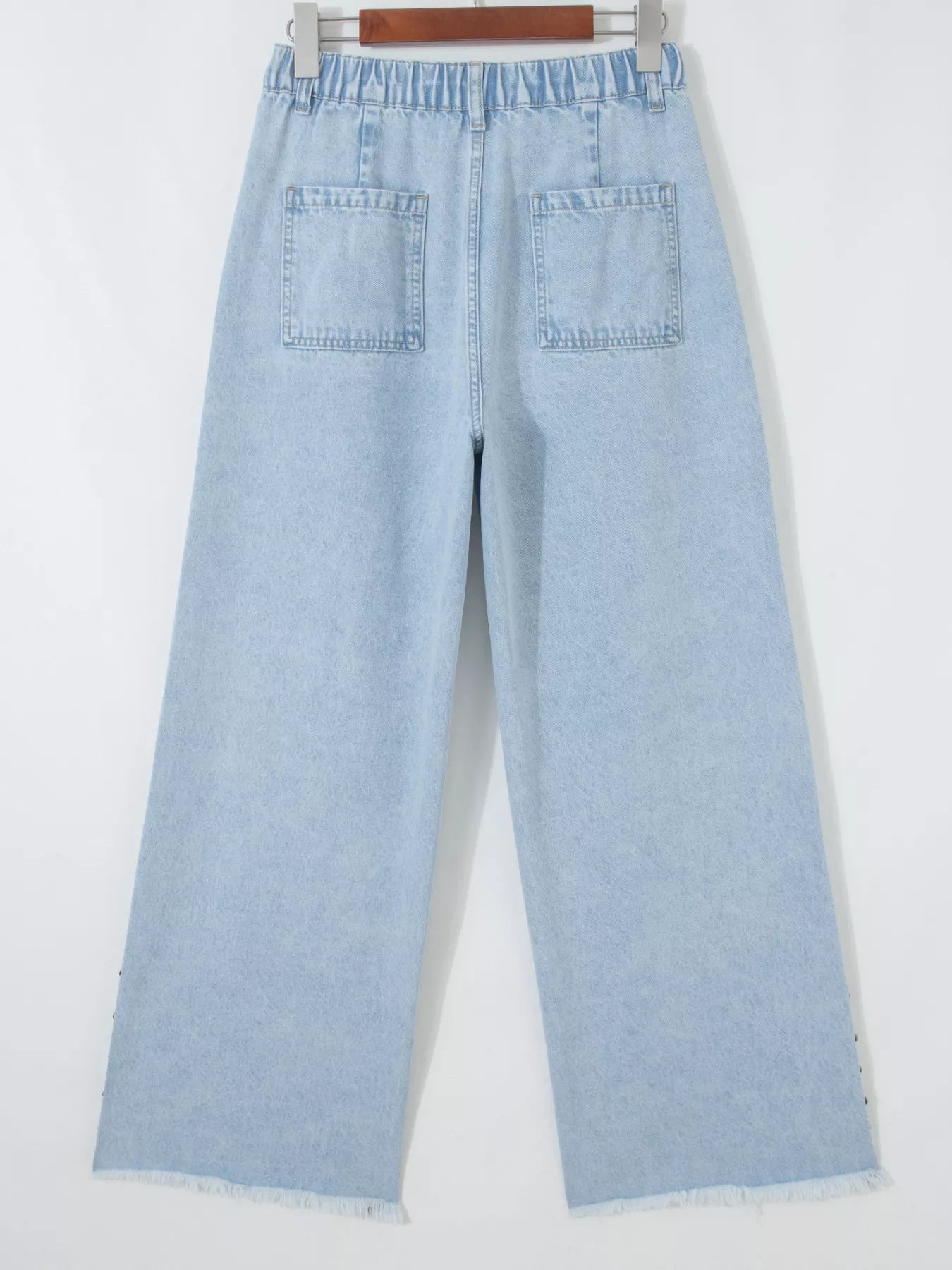 Studded Wide Leg Jeans with Frayed Hem and Side Slits - Plush Fashion Hub