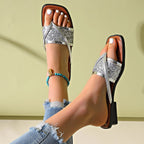 Women's minimalist toe-post flat sandals by Trendsi, casual summer footwear with comfortable, airy design for everyday wear.