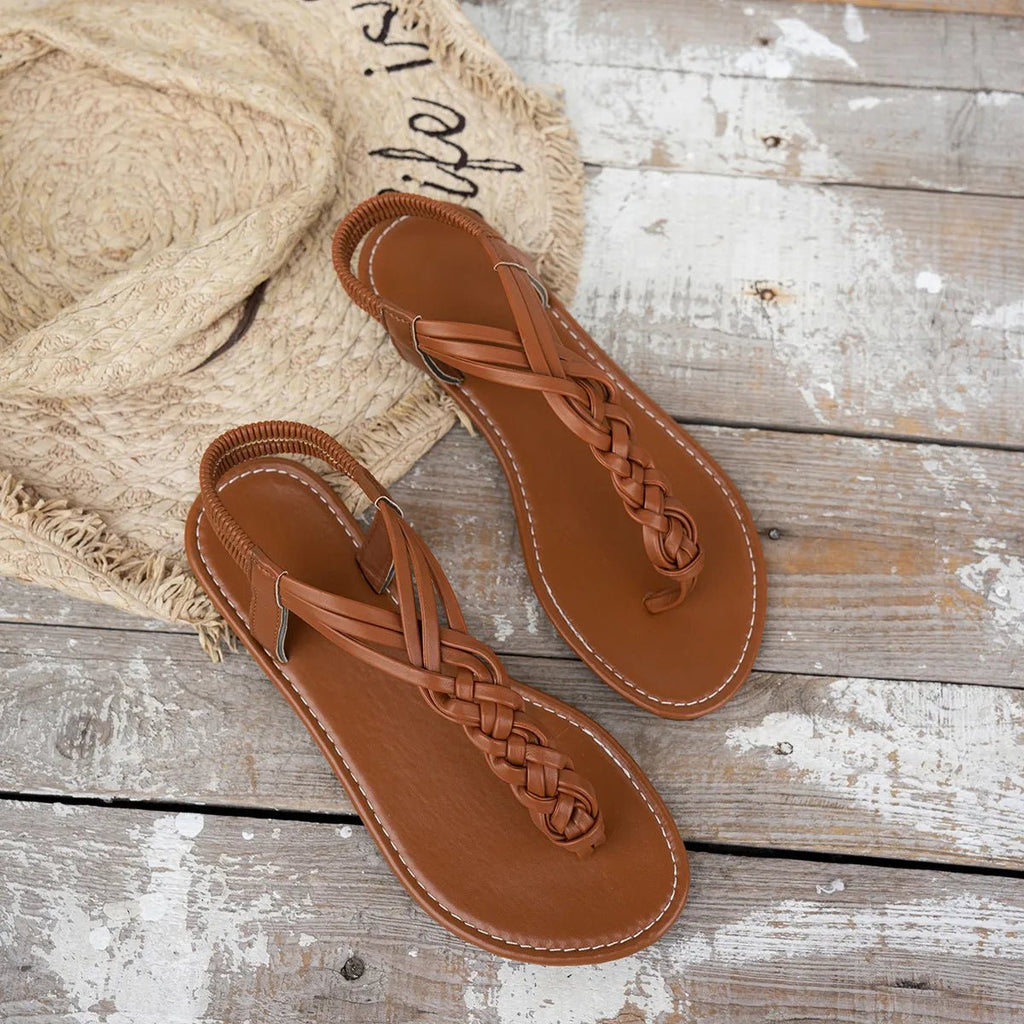 Women's chic PU leather toe post flat sandals by Trendsi, featuring comfortable summer footwear with stylish design and open toe style.