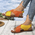 Women's two-tone crisscross strap flat sandals by Trendsi, stylish summer casual footwear with comfortable slip-on design.