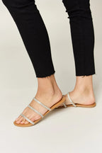 Women's rhinestone three-strap flat sandals by Trendsi, sparkly summer shoes with comfortable design and stylish embellishments.